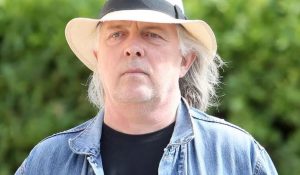 Who is Rik Mayall?